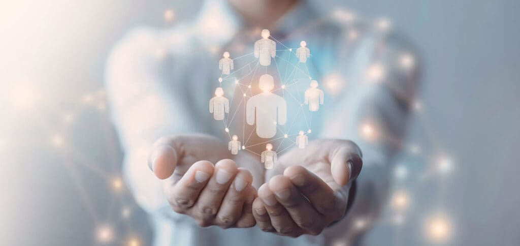 holding people icons in hands
