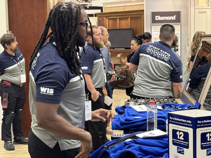 WIS employees standing in an appliance store 3