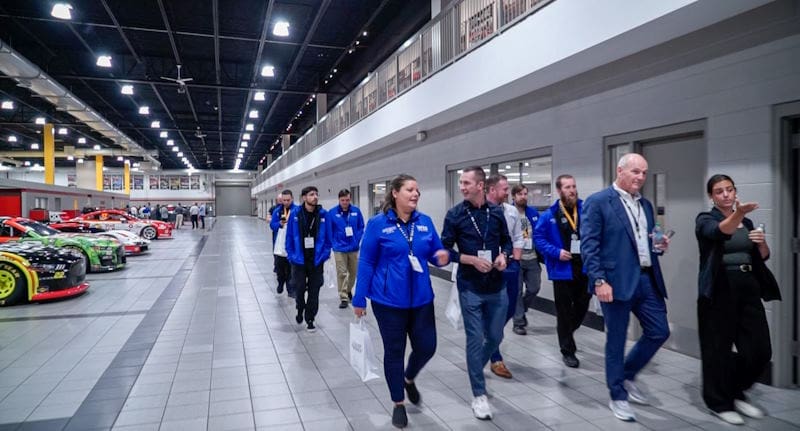 WIS employees walking through a car dealership